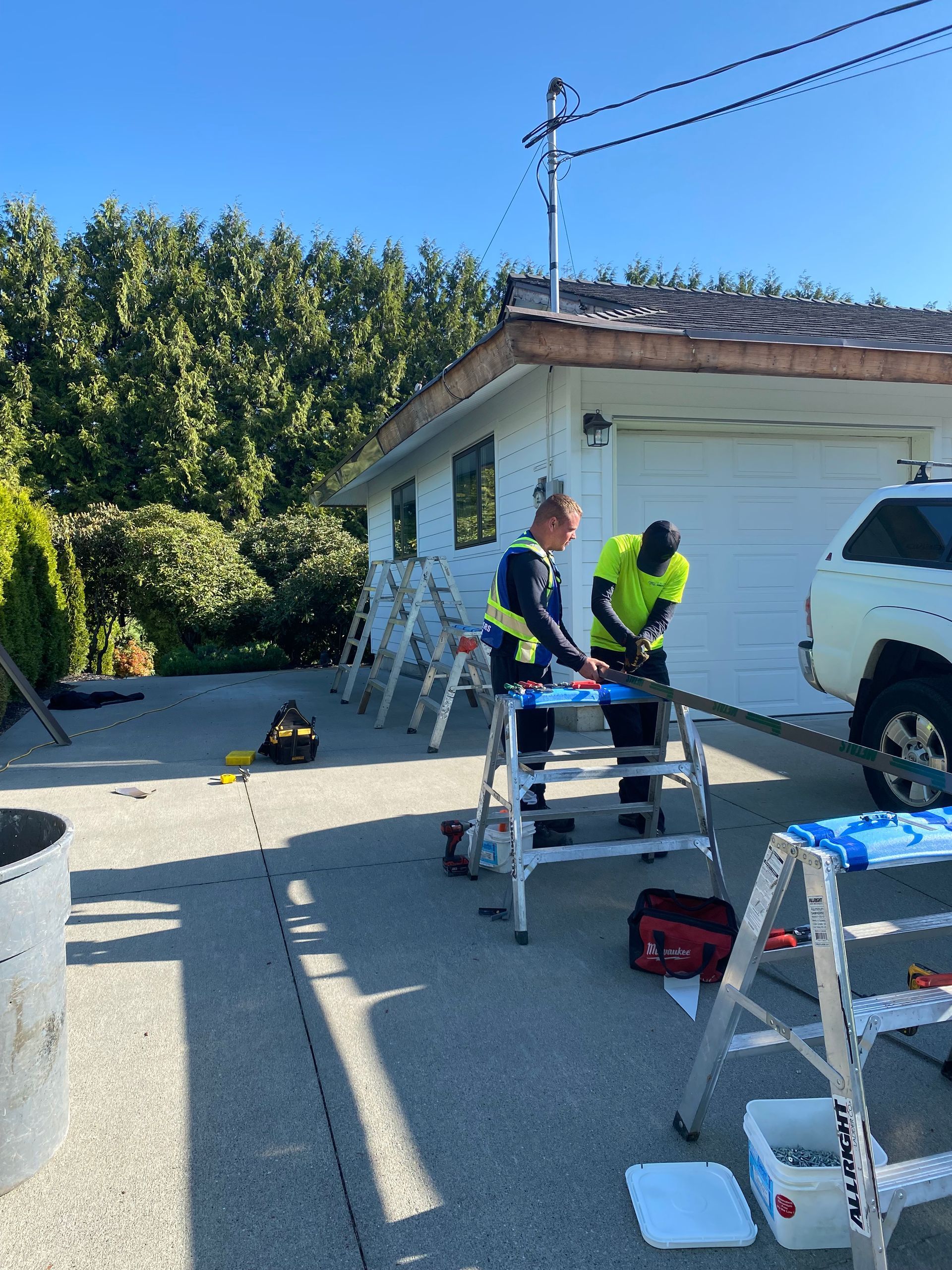 worker installing gutter pipeline