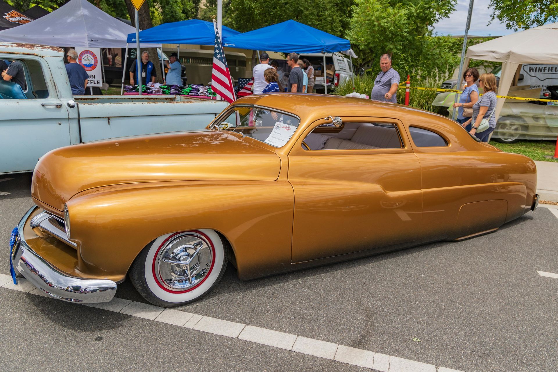 A lowrider car at a car show