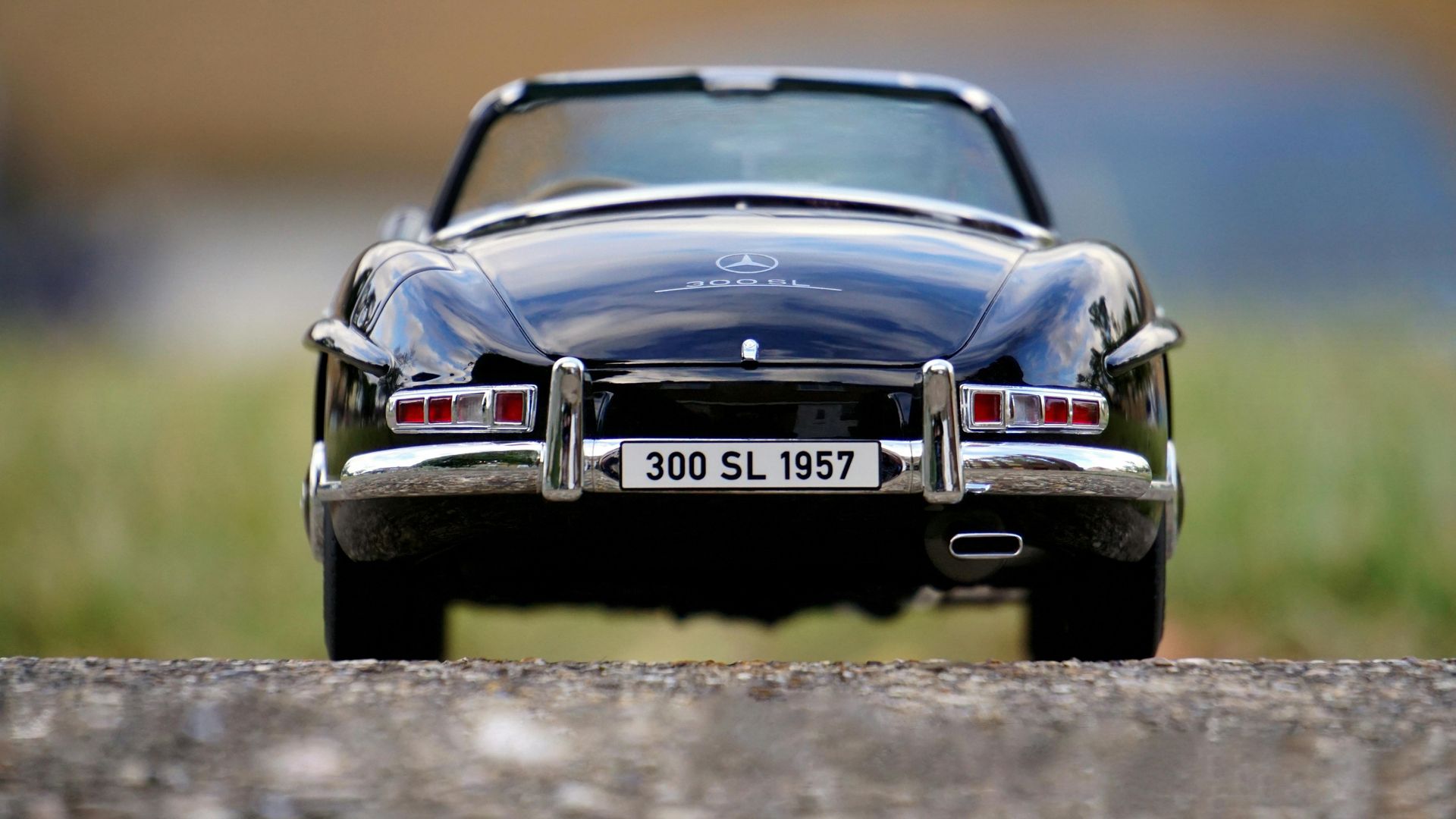 A European car is sitting on a road