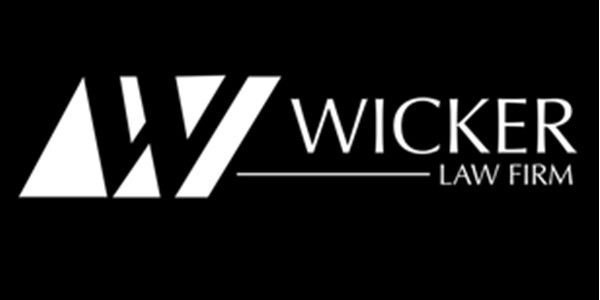 A black and white logo for wicker law firm