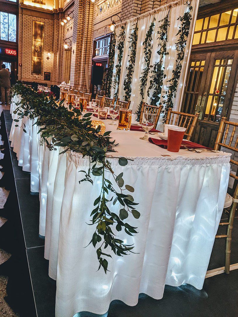 Long table decoration at Baker street — Fort Wayne, IN — Goeglein's Catering