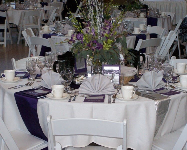 White table cloth with purple — Fort Wayne, IN — Goeglein's Catering