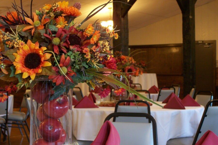 Flower with apples — Fort Wayne, IN — Goeglein's Catering