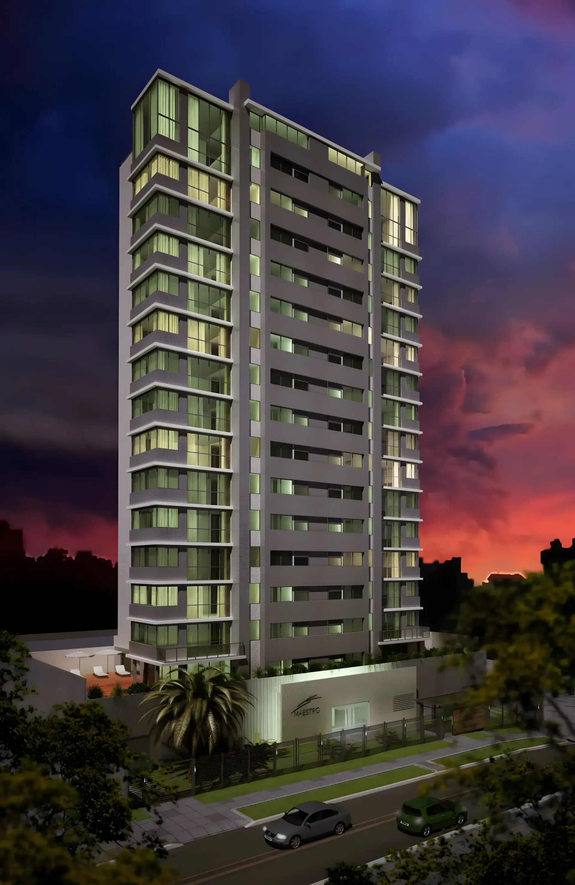 Prédio residencial moderno de vários andares contra um céu crepuscular. Fachada cinza com inúmeras janelas e paisagismo.