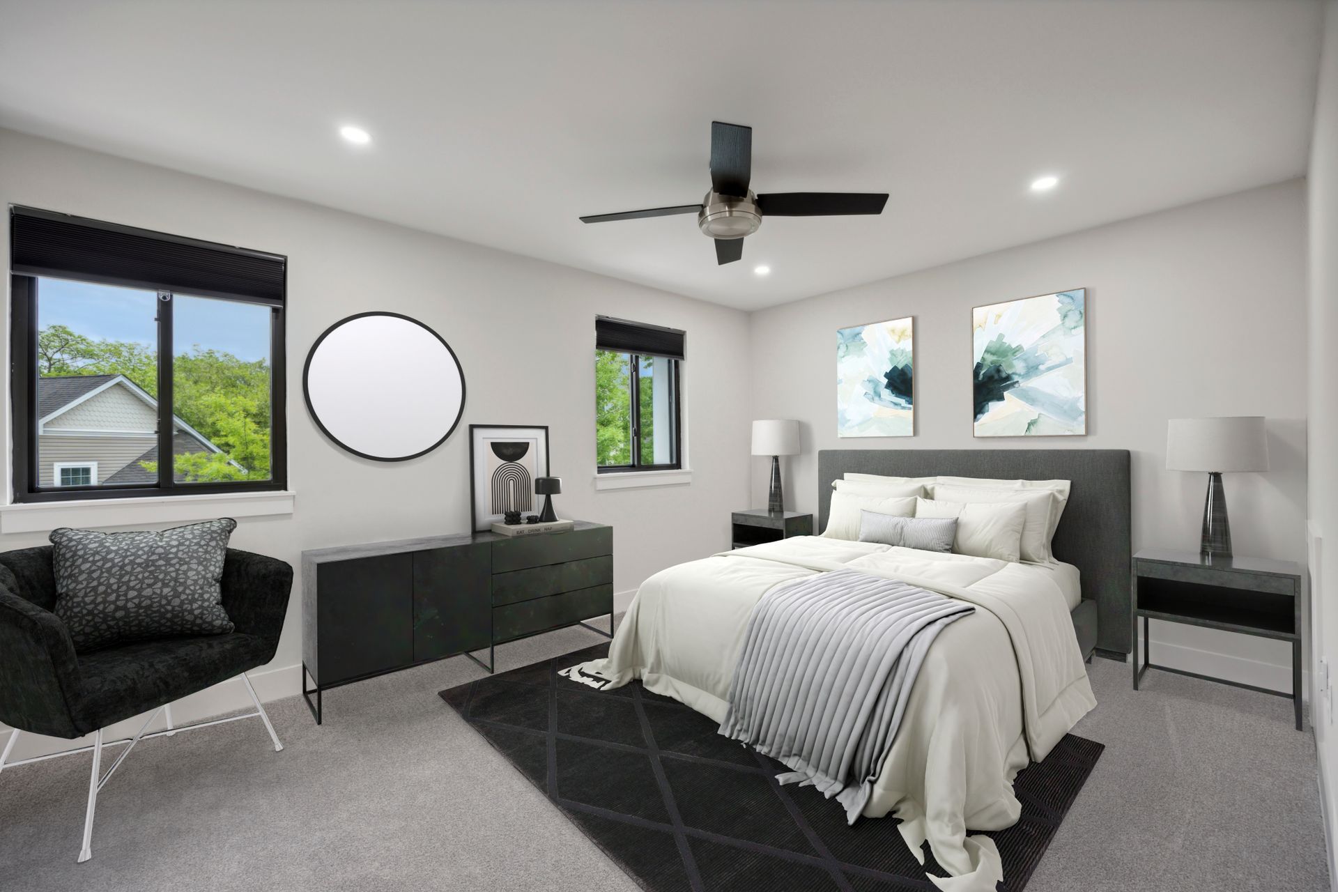 Bedroom with gray walls, dark furniture, and modern decor.