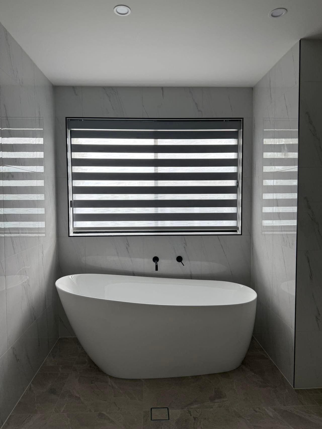 Bathroom with A White Freestanding Tub Gray and White Blinds — U Curtains in Acacia Ridge, QLD