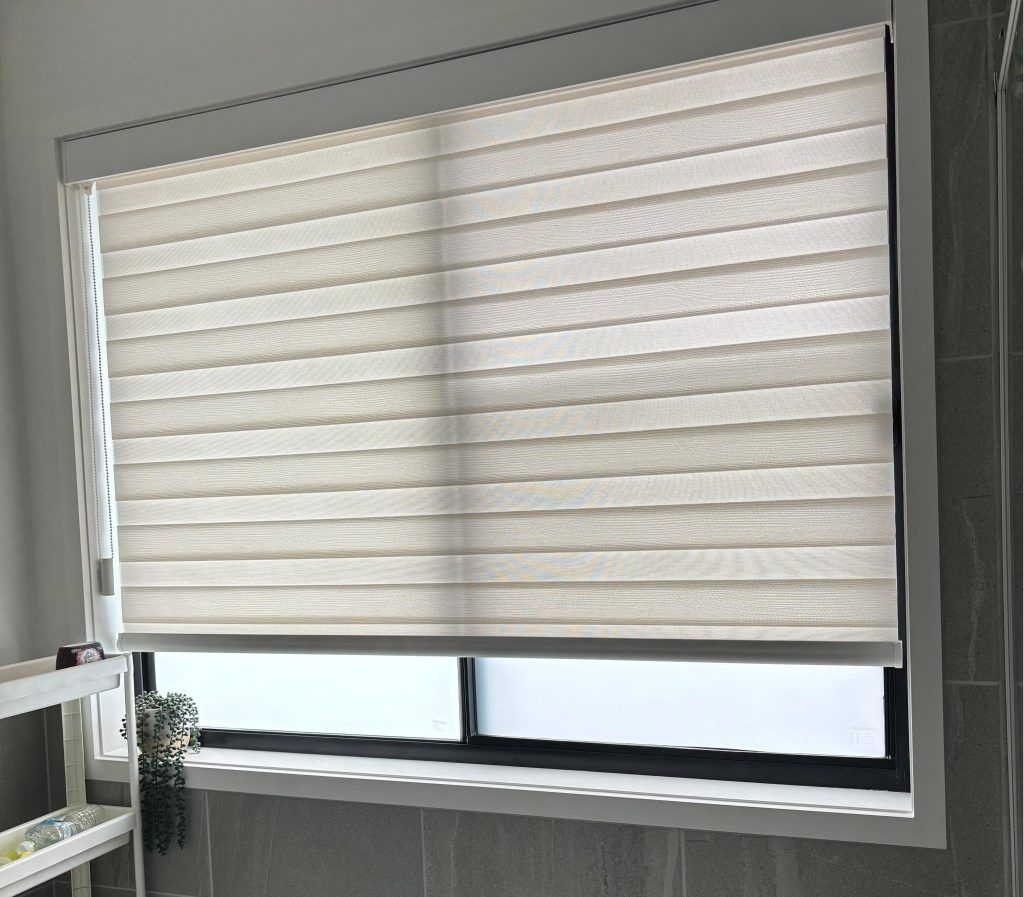 Beige Dual-Layer Window Blinds Partially Covering a Window — U Curtains in Acacia Ridge, QLD