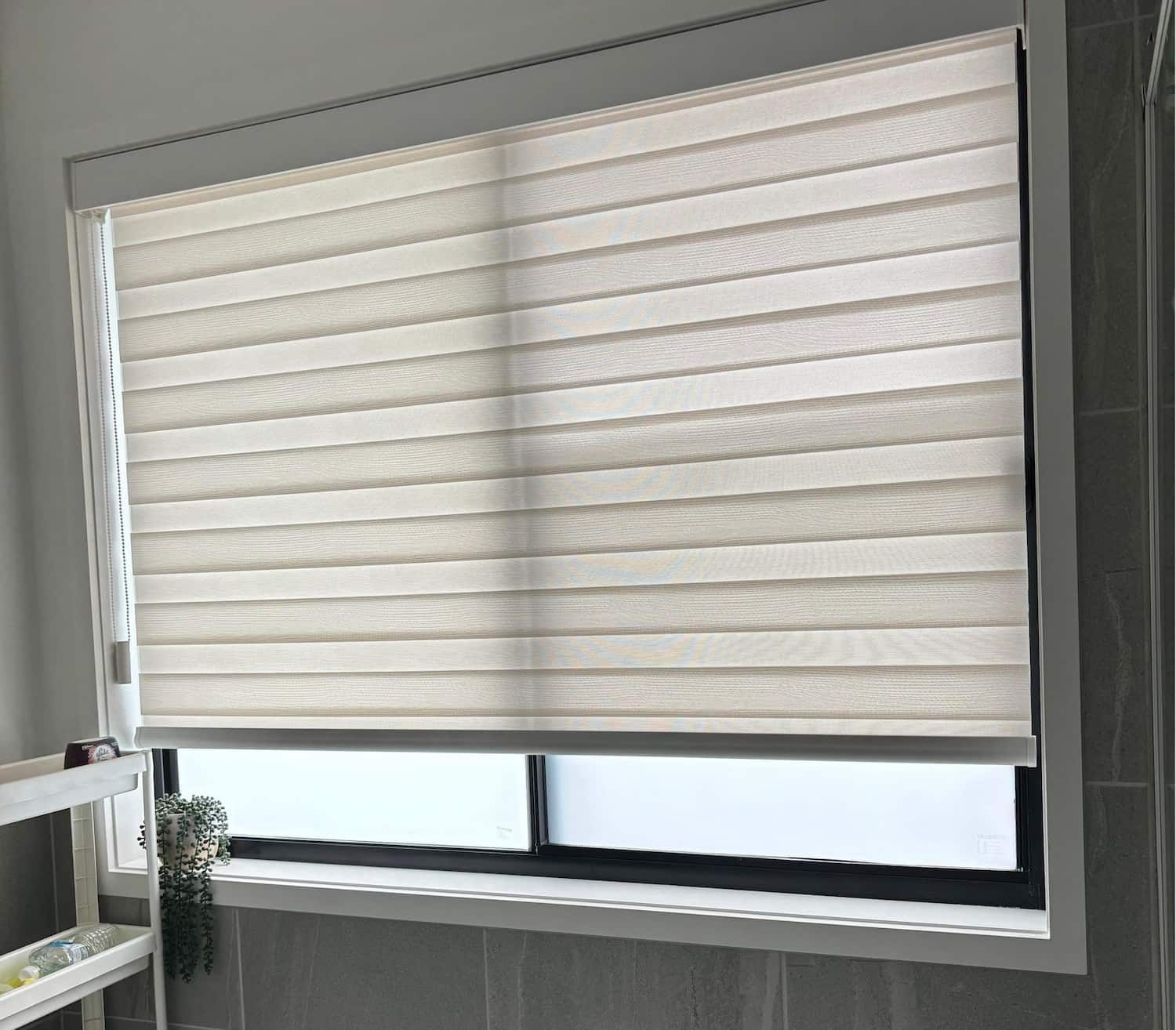 Cream-Colored Zebra Blinds Partially Covering a Window — U Curtains in Acacia Ridge, QLD