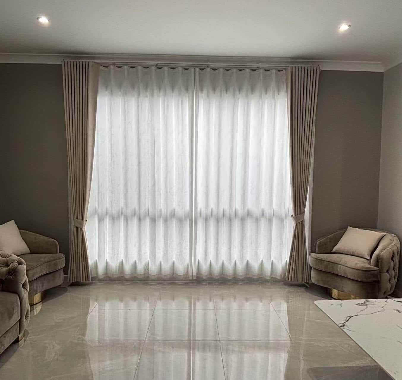 Living Room with Tall White Curtains, Two Velvet Armchairs and Glossy Tiled Floor — U Curtains in Acacia Ridge, QLD