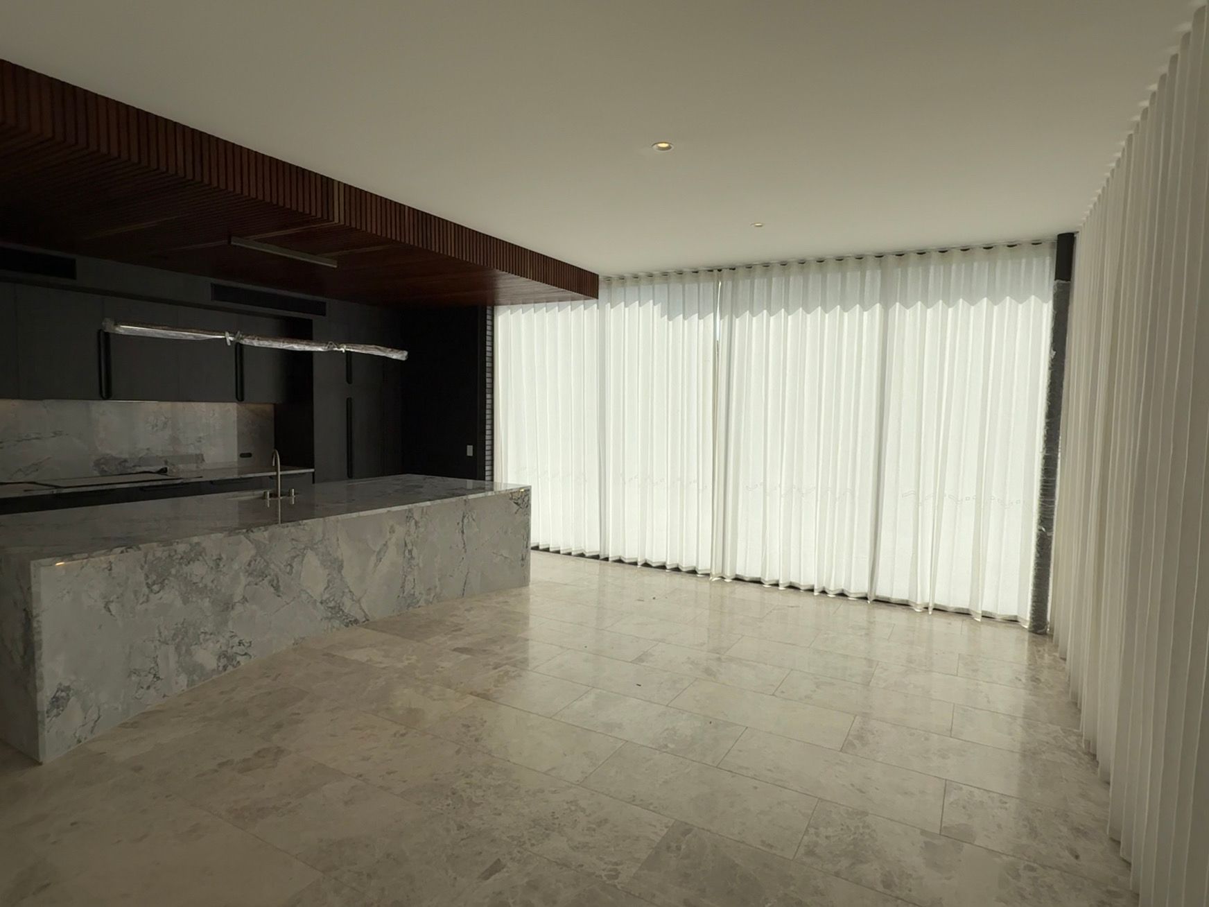 Modern Kitchen With a Granite Island White Curtains — U Curtains in Acacia Ridge, QLD