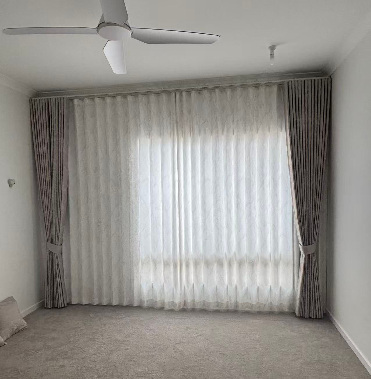 A Room With a Large Window and Light-colored Curtains — U Curtains in Acacia Ridge, QLD