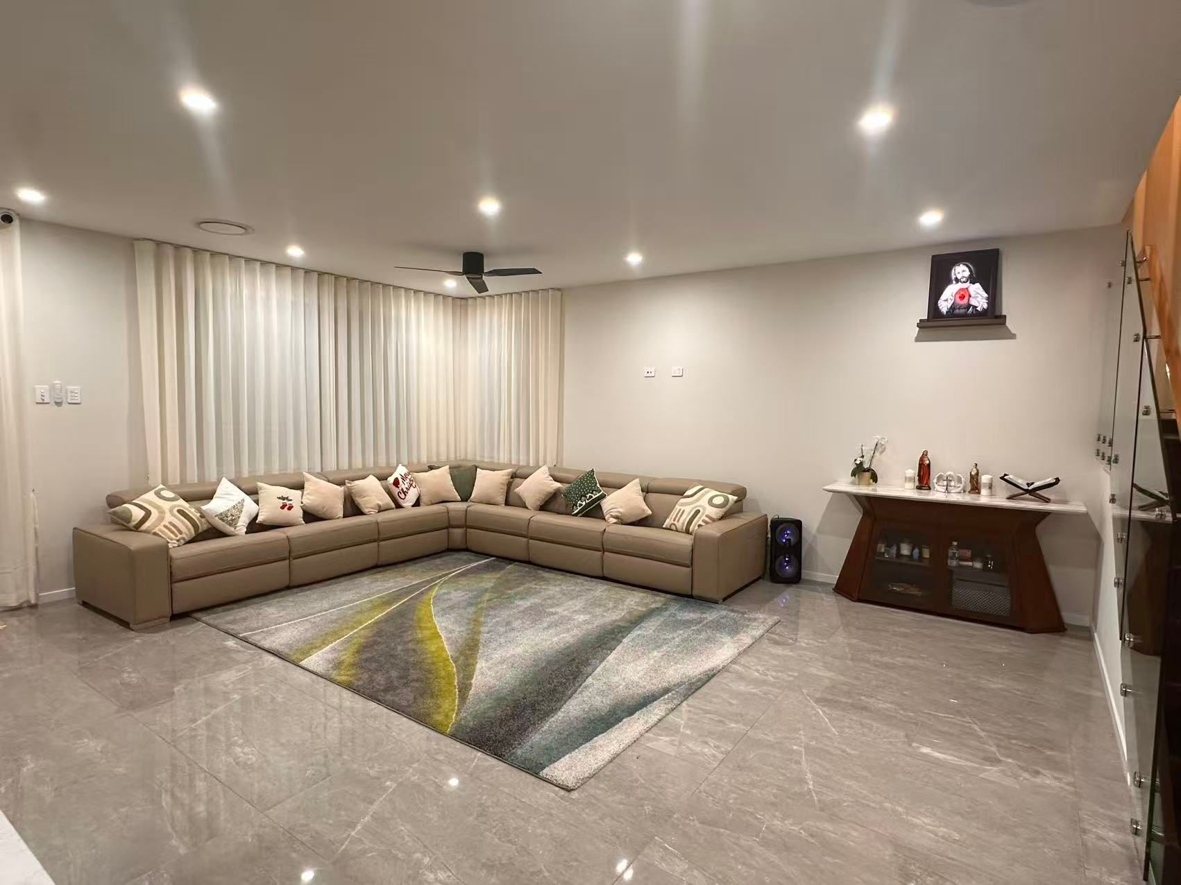 Beige Sectional Sofa on a Patterned Rug — U Curtains in Acacia Ridge, QLD