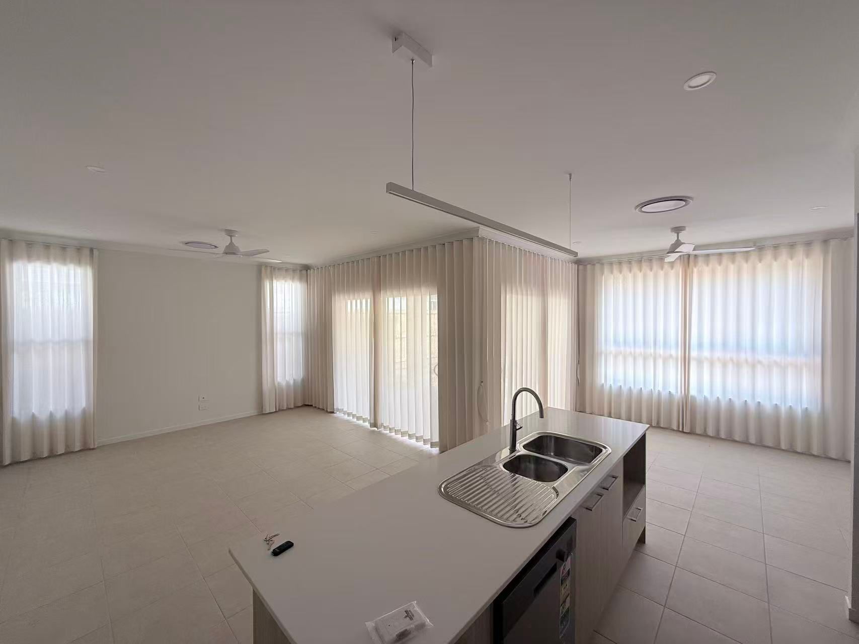 Interior View of an Open-plan Kitchen and Living Space — U Curtains in Acacia Ridge, QLD