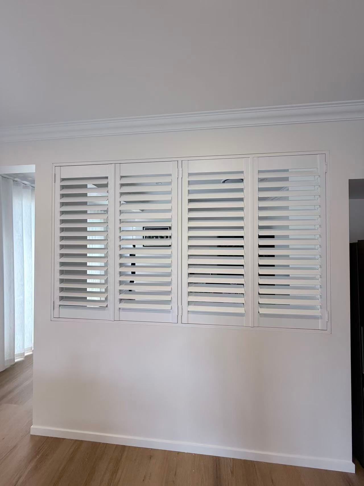 White Plantation Shutters on a Wall — U Curtains in Acacia Ridge, QLD