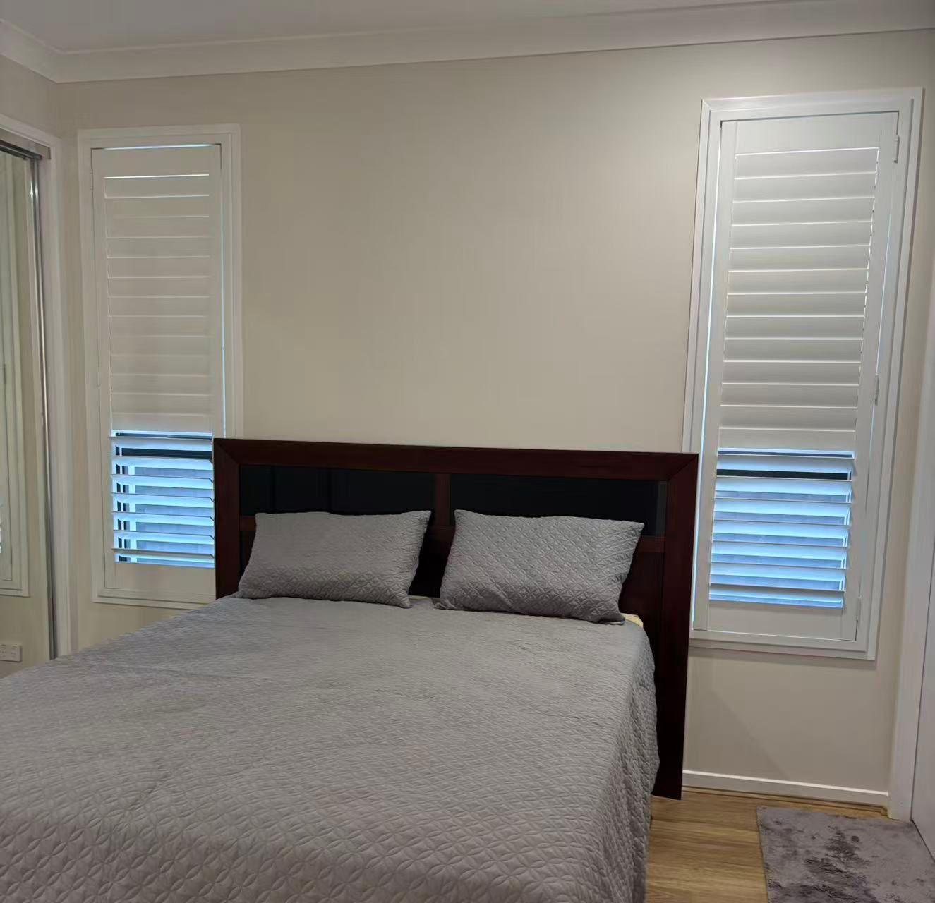 Bedroom With Gray Bedding — U Curtains in Acacia Ridge, QLD