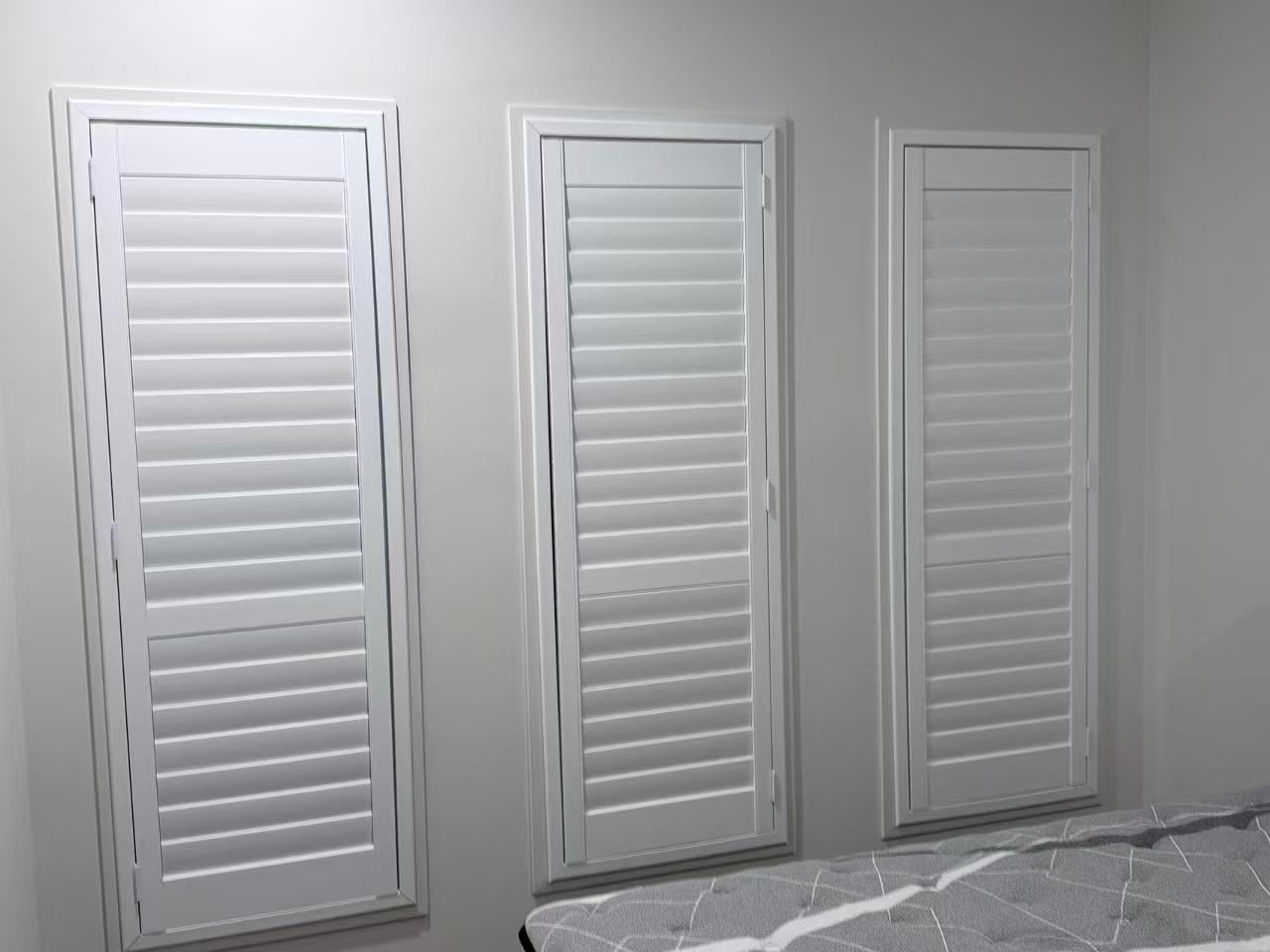 Three White Shutters on a Gray Wall Above a Bed — U Curtains in Acacia Ridge, QLD