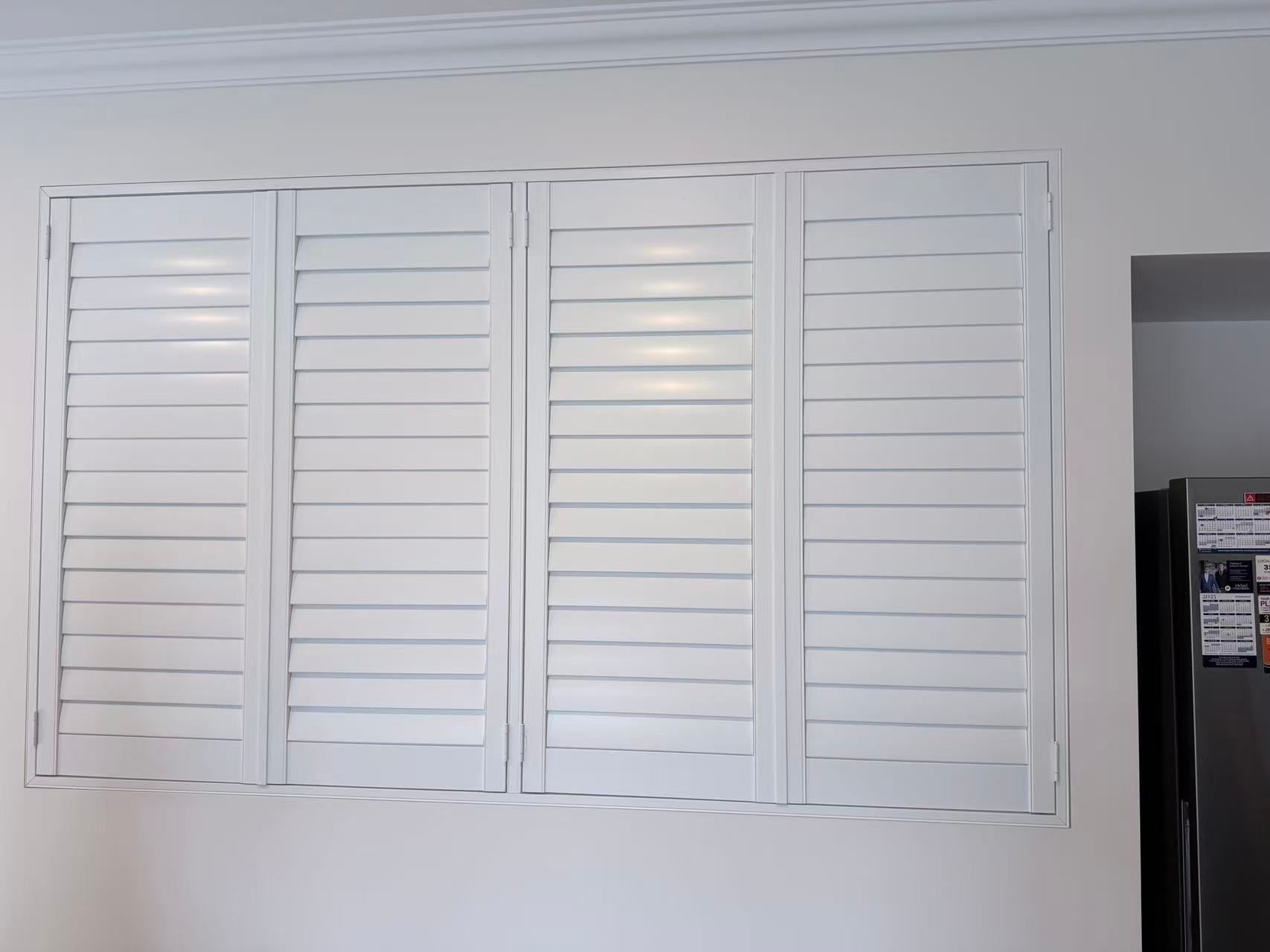 Four White Shuttered Windows on a White Wall — U Curtains in Acacia Ridge, QLD