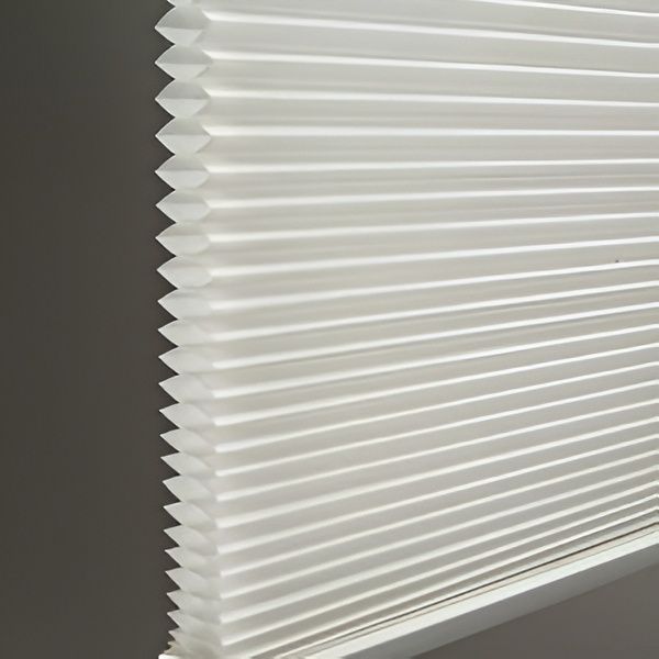 Close-Up of White Pleated Cellular Shades Partially Covering a Window — U Curtains in Acacia Ridge, QLD