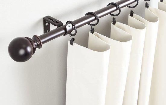 Dark Brown Curtain Rod with A Round Finial Holding up White Curtains Against a White Wall — U Curtains in Acacia Ridge, QLD