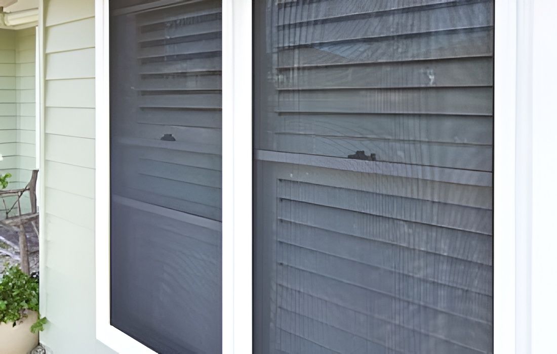 Two Side-By-Side Windows with Black Screens Against Gray-Blue Horizontal Slats — U Curtains in Acacia Ridge, QLD