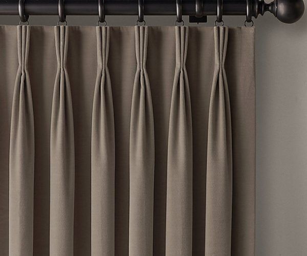 Tan Pleated Drapery Panels Hanging from A Dark Curtain Rod with Rings — U Curtains in Acacia Ridge, QLD