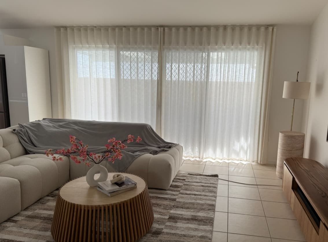A Living Room with White Curtains, a Beige Sectional Sofa with A Gray Throw — U Curtains in Acacia Ridge, QLD