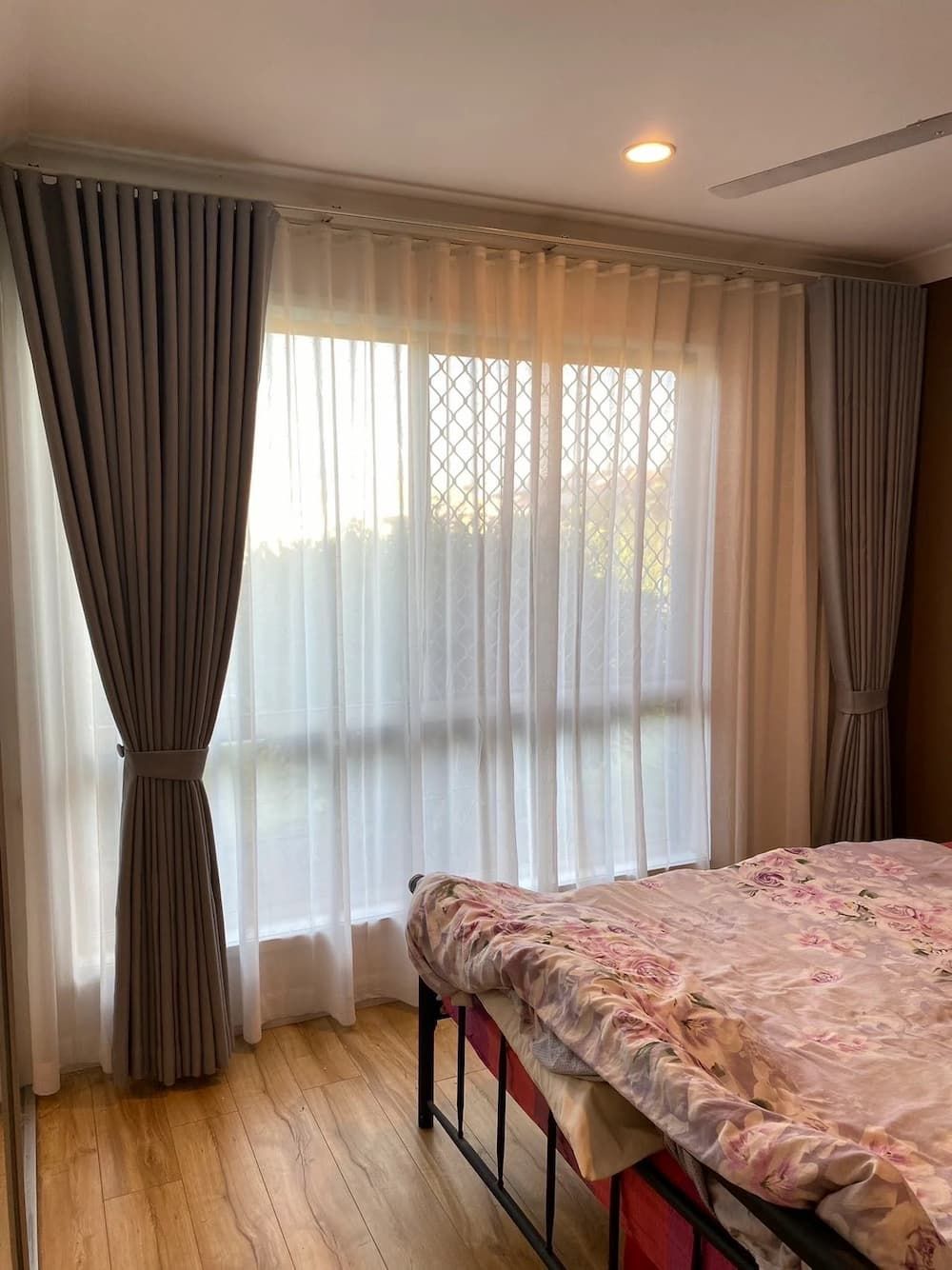 Bedroom with Sheer White and Grey Drapes Framing a Window — U Curtains in Acacia Ridge, QLD