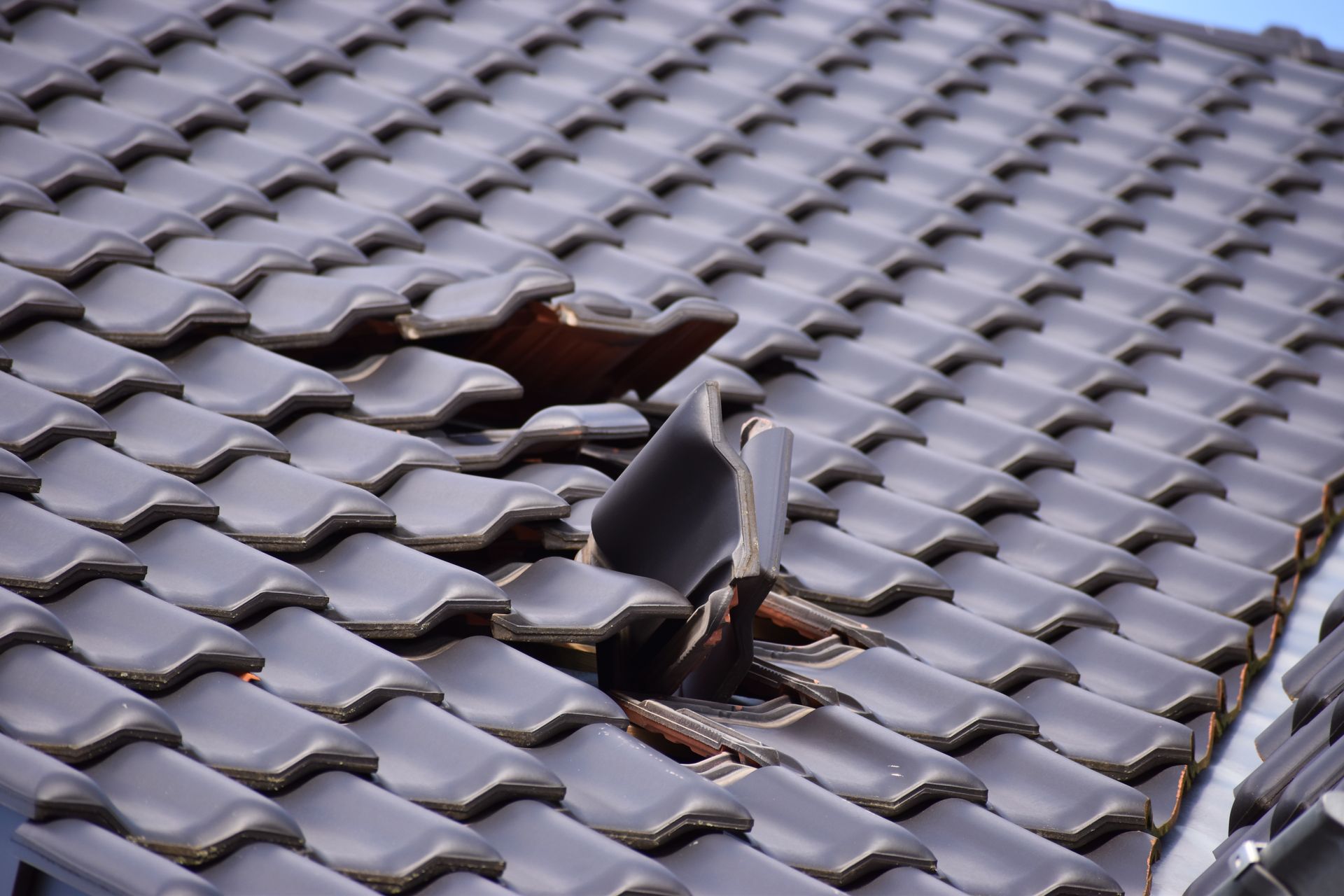 A close up of a roof with a hole in it