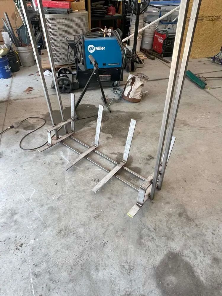 A welding machine in a garage