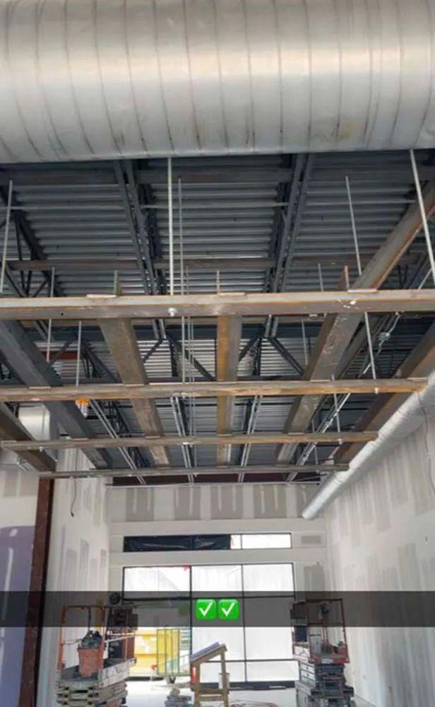 Working on the ceiling of a building