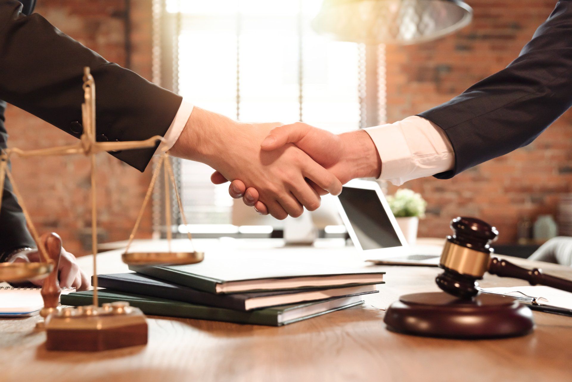 Lawyer Shaking Hands With Client — Newark, NJ — Tesoroni & LeRoy