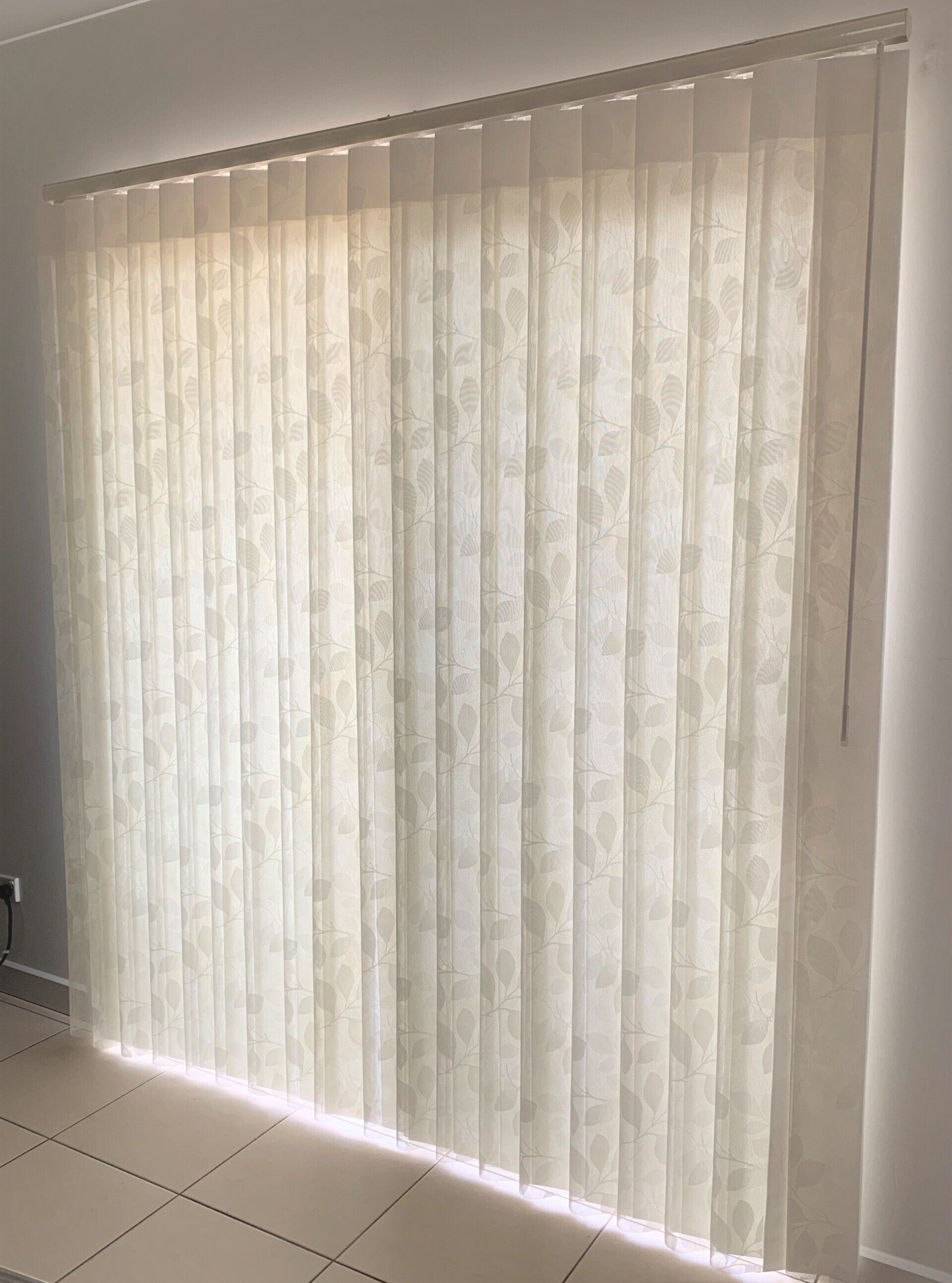 Beige Vertical Blinds Covering a Window — Alice Mobile Blinds in Ciccone, NT