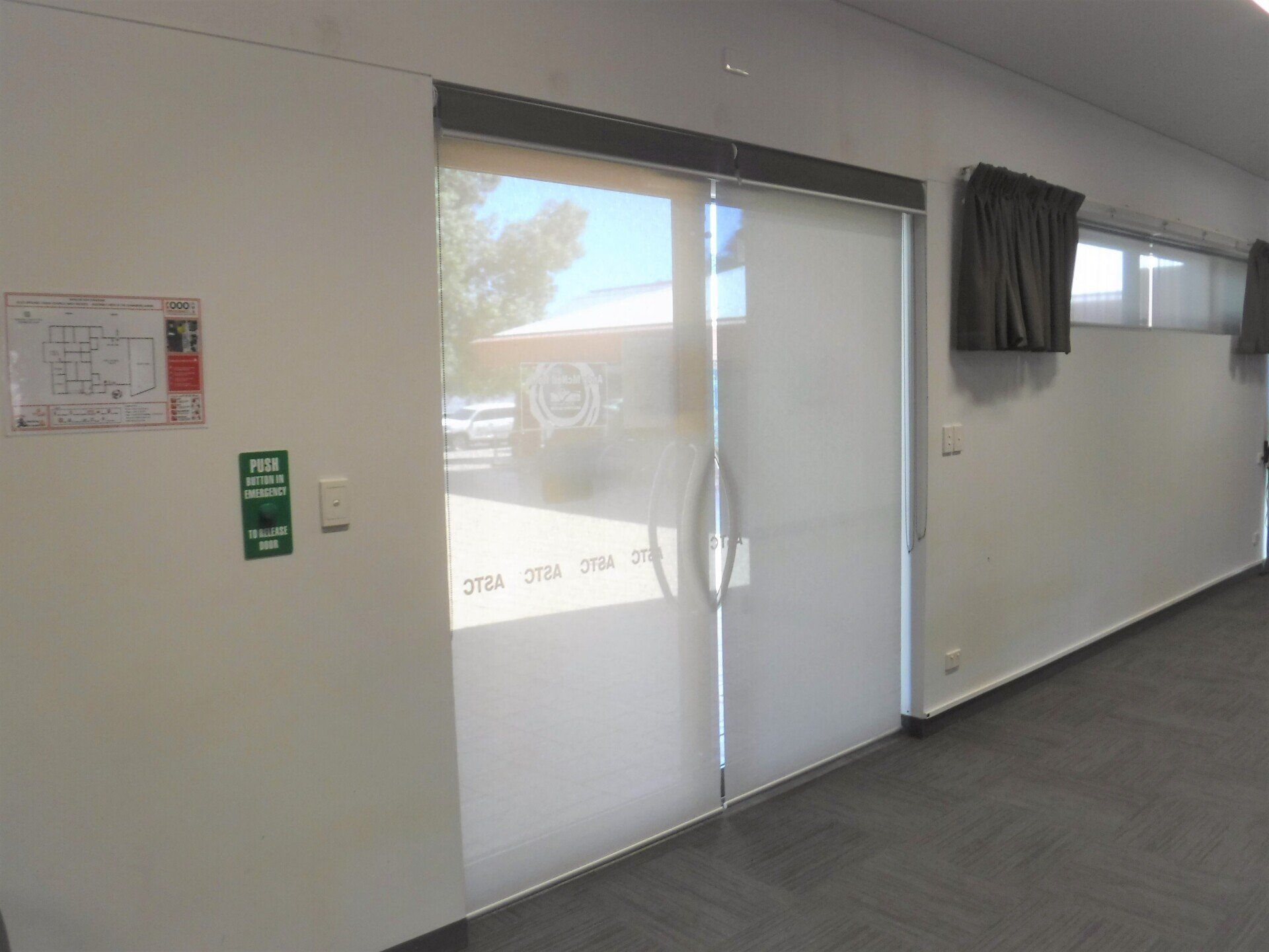 Sliding Glass Doors with Closed Blinds — Alice Mobile Blinds in Ciccone, NT