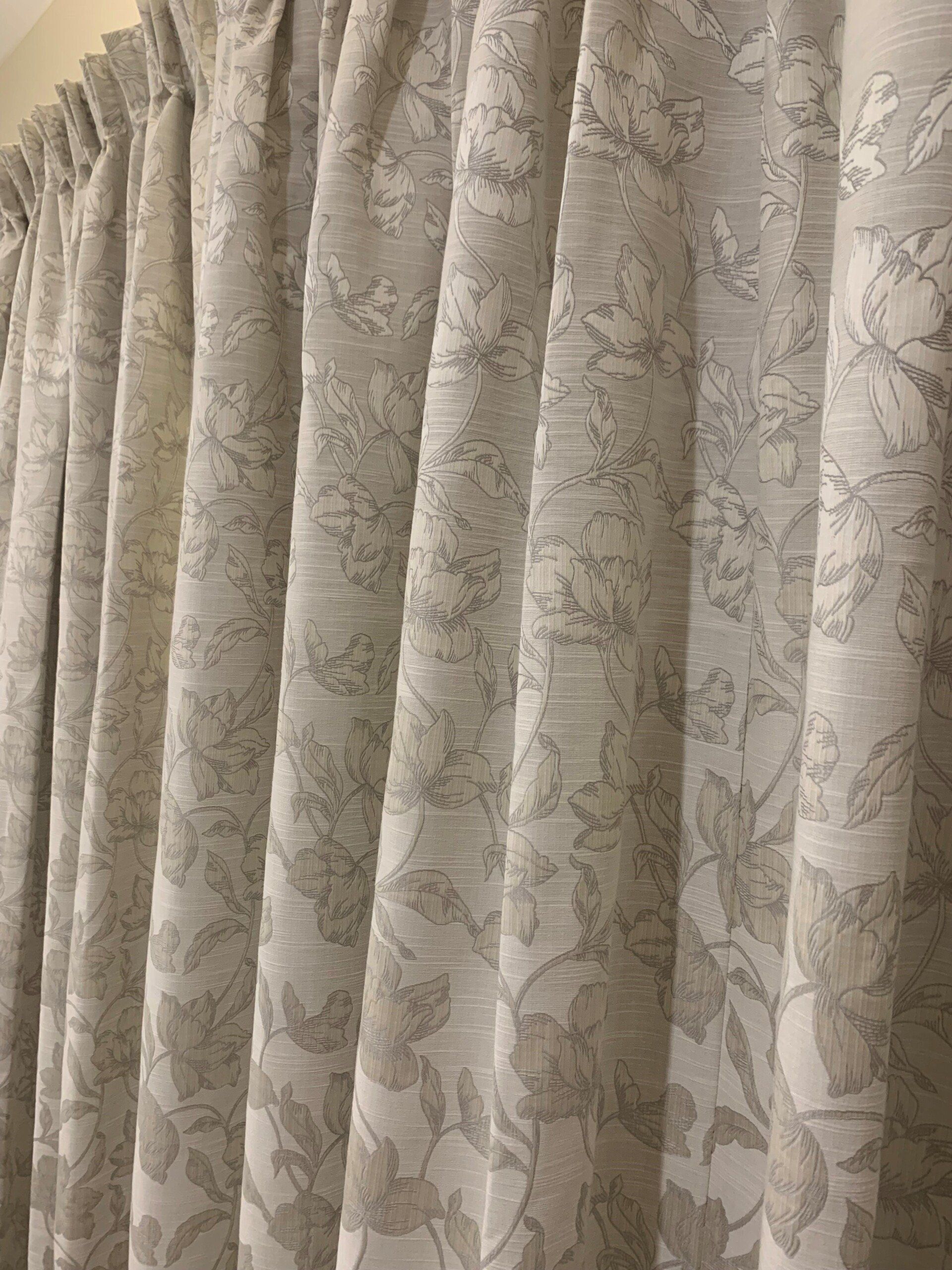 Pleated Light-Coloured Curtains with A Floral Pattern — Alice Mobile Blinds in Ciccone, NT