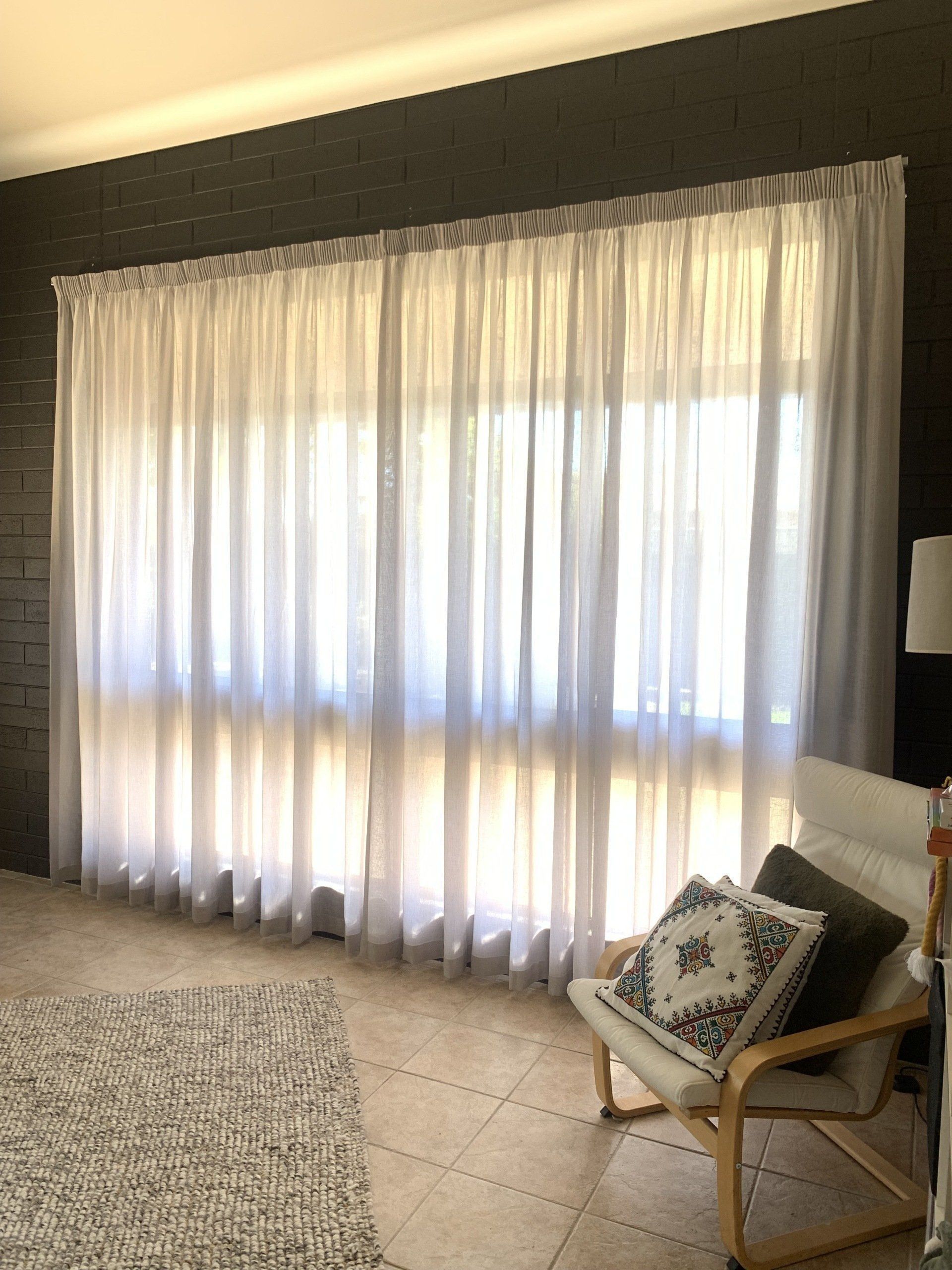 Sheer Curtains Over a Window in A Room — Alice Mobile Blinds in Ciccone, NT