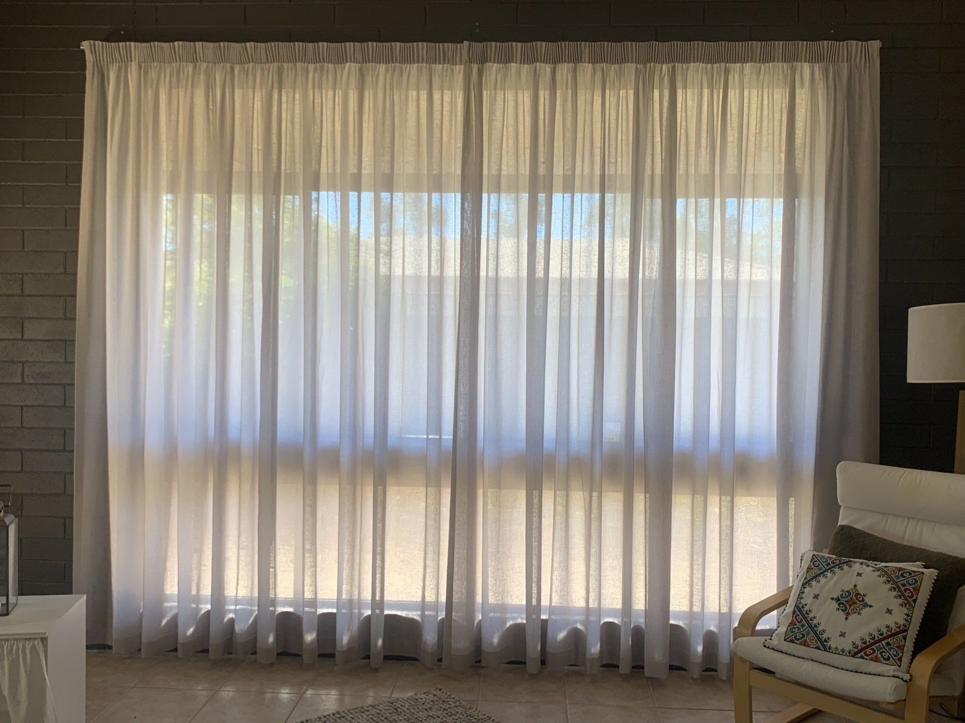 Sheer White Curtains Covering a Window — Alice Mobile Blinds in Ciccone, NT