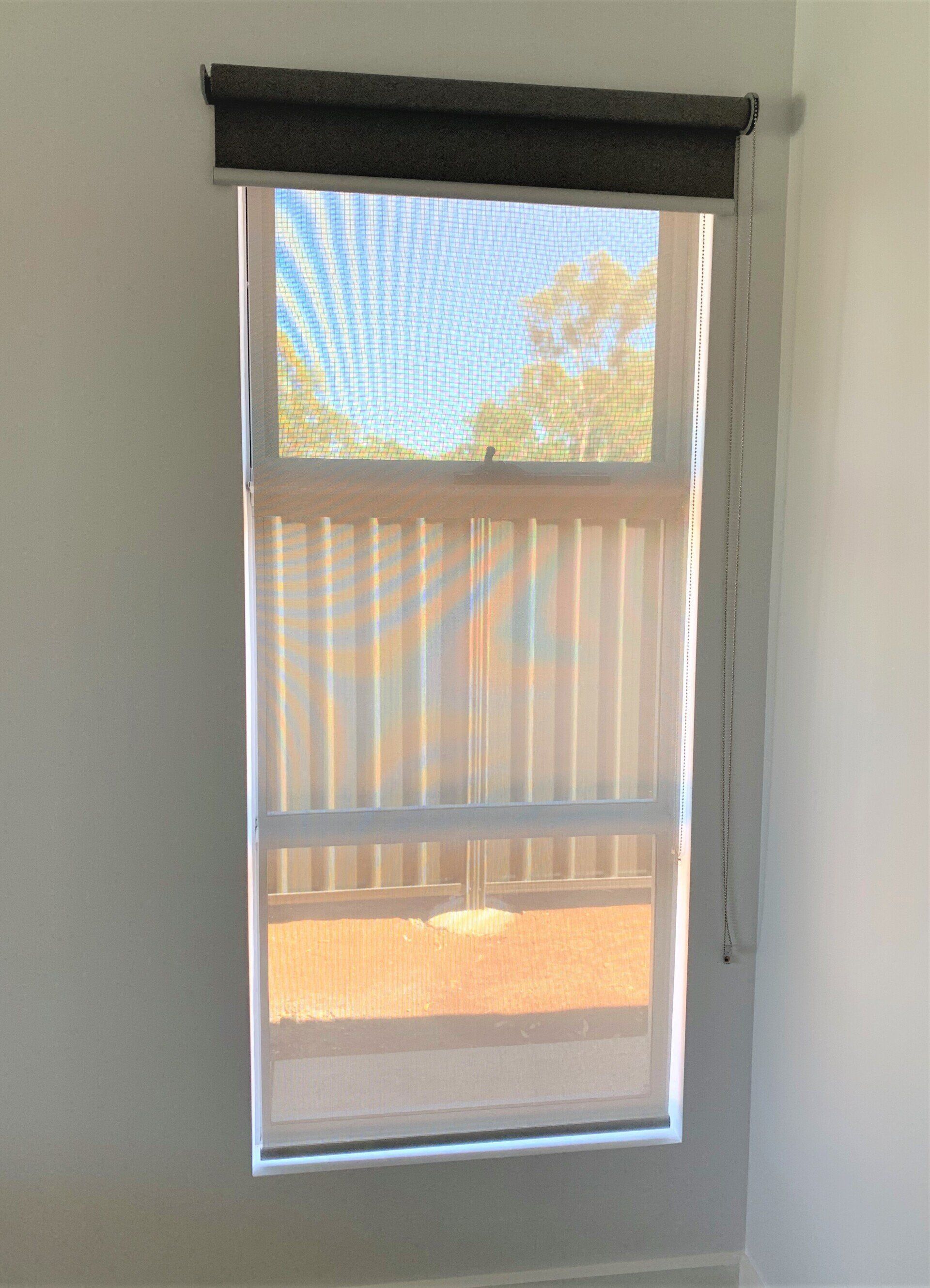 Window with A Dark Brown Roller Shade and Light Beige Shade — Alice Mobile Blinds in Ciccone, NT