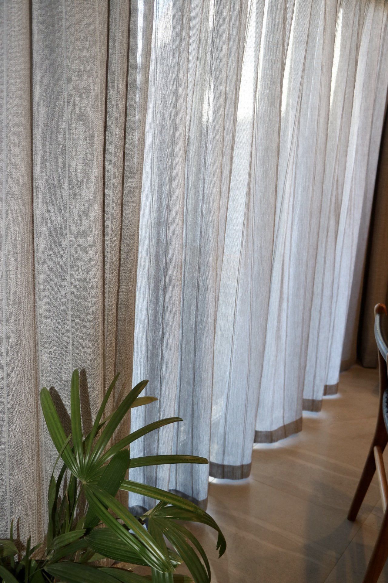Sheer White Curtains Partially Open with Sunlight — Alice Mobile Blinds in Ciccone, NT