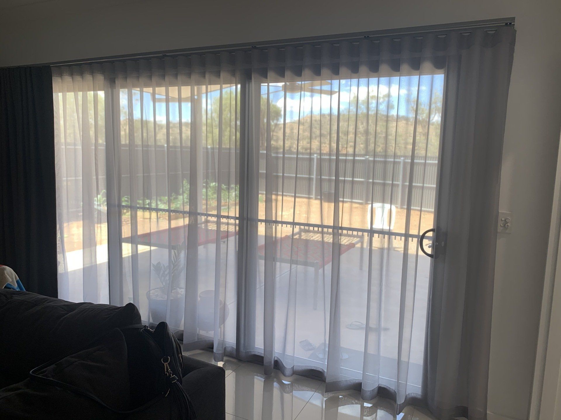 Sheer White Curtains Covering a Sliding Glass Door — Alice Mobile Blinds in Ciccone, NT