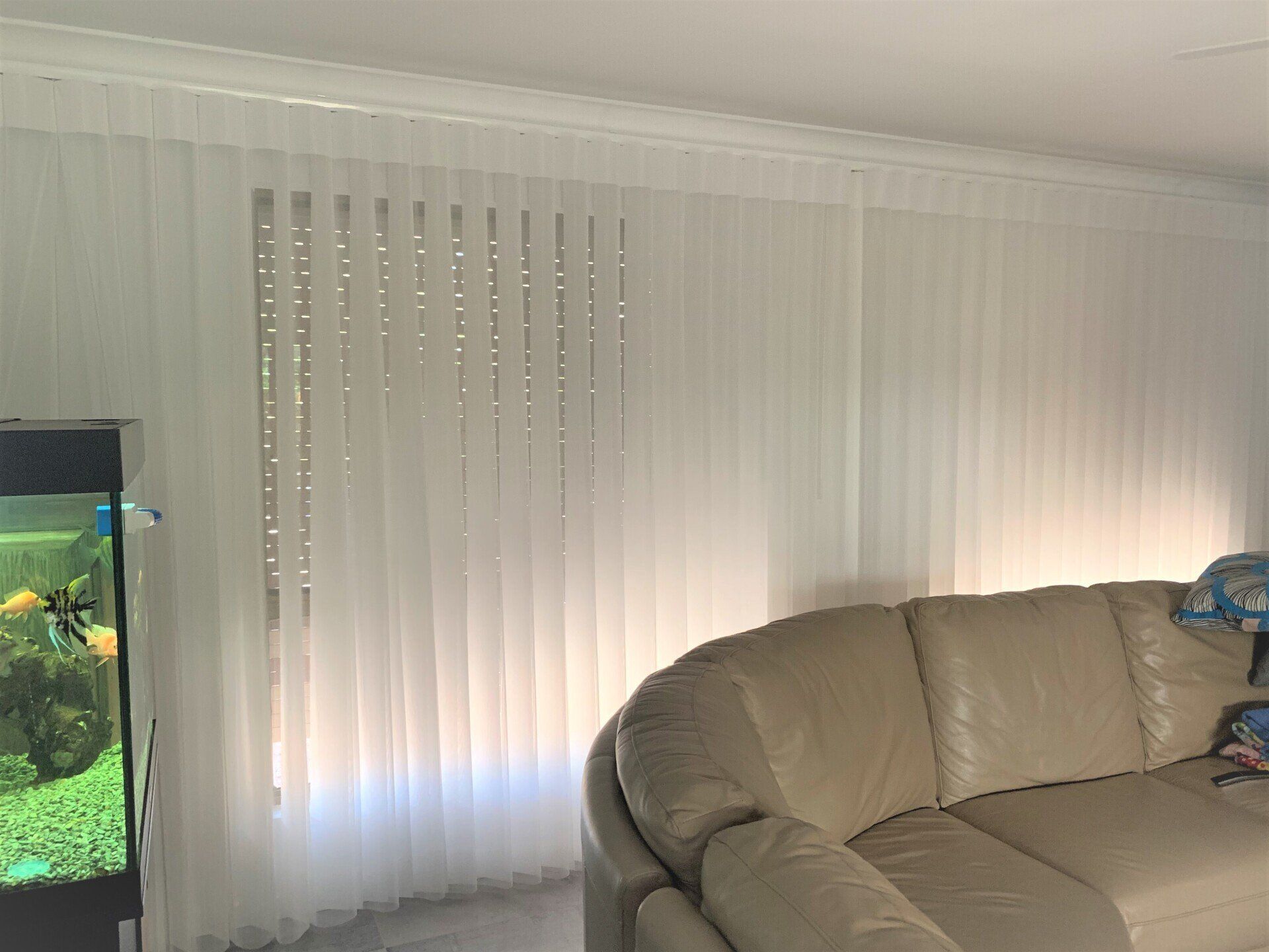 Living Room with White Sheer Curtains — Alice Mobile Blinds in Ciccone, NT