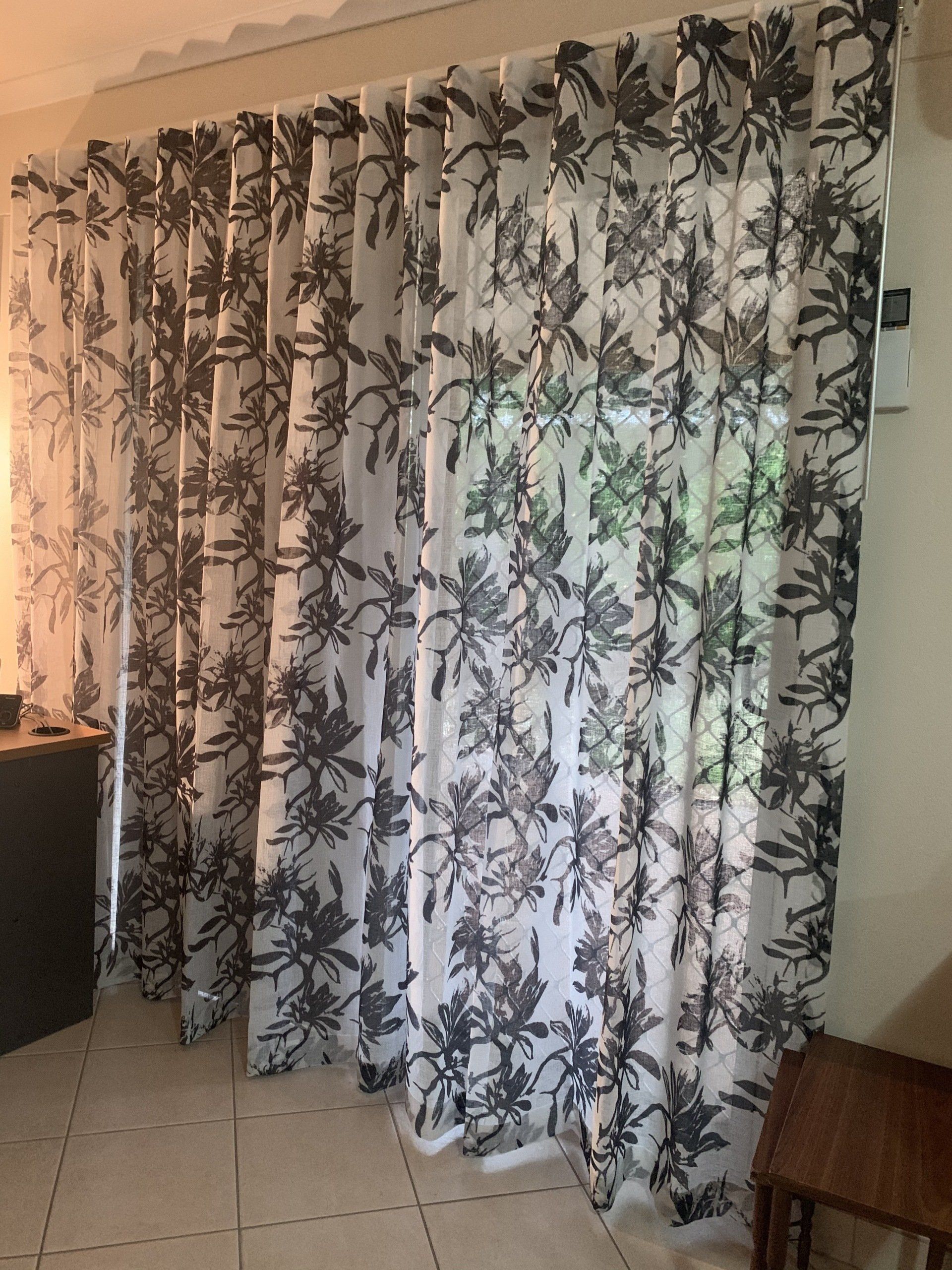 Sheer White Curtains with A Black Floral Pattern — Alice Mobile Blinds in Ciccone, NT