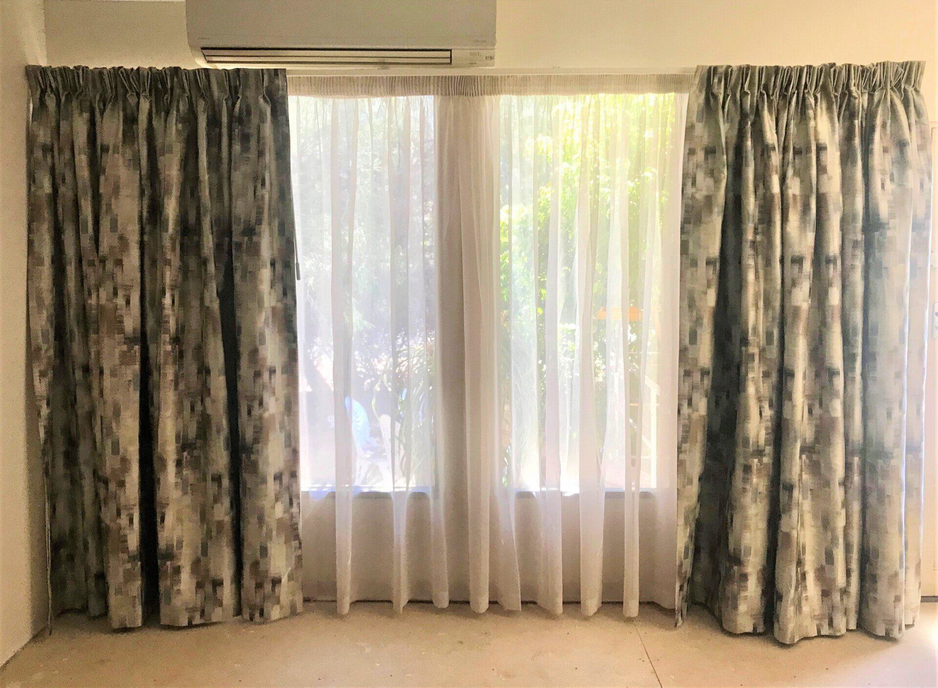 Window with Patterned Grey Curtains and Sheer — Alice Mobile Blinds in Ciccone, NT