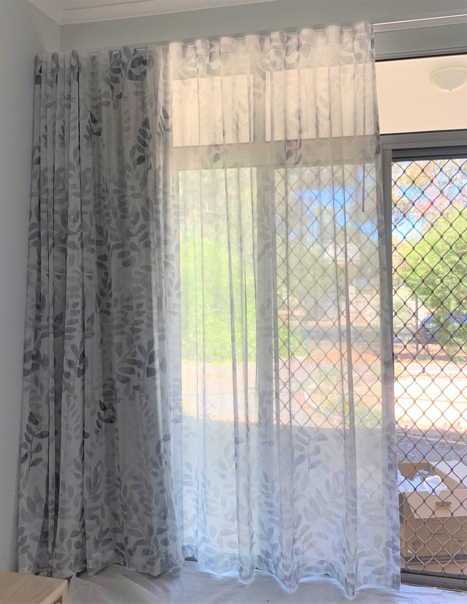 Window with Sheer White Patterned Curtains — Alice Mobile Blinds in Ciccone, NT