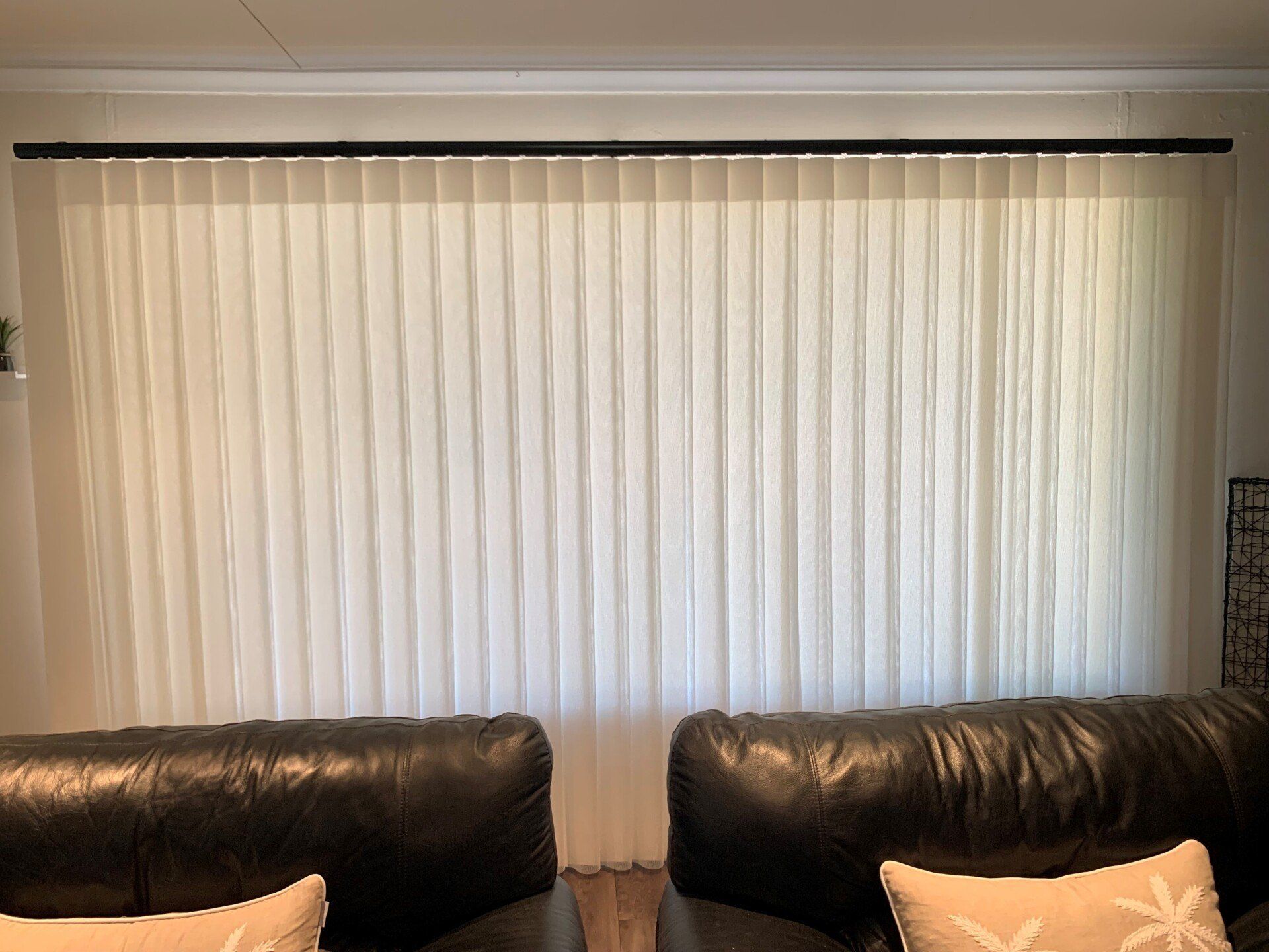 Off-White Vertical Blinds Cover a Large Window — Alice Mobile Blinds in Ciccone, NT
