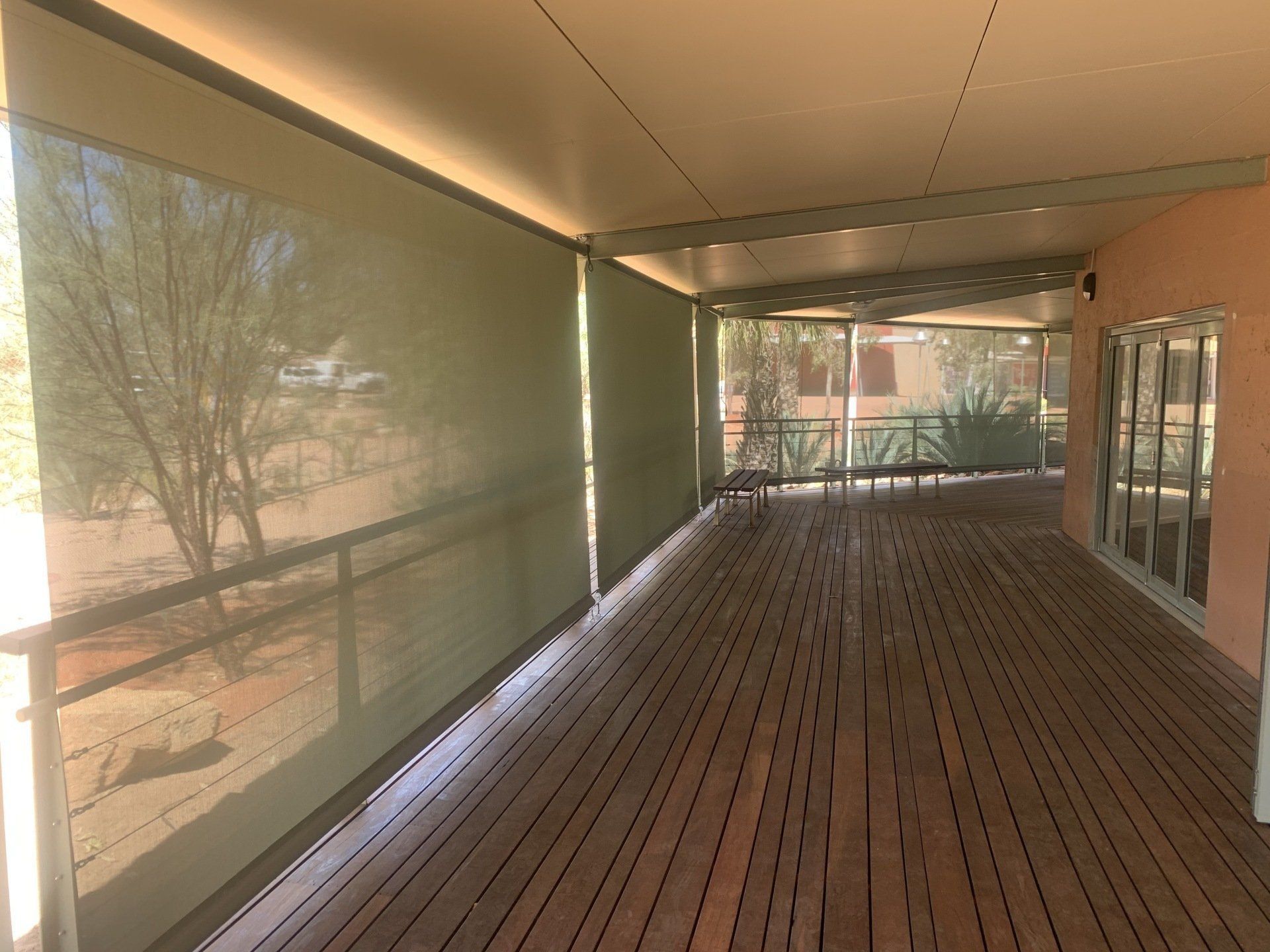 Wooden Deck with Retractable Sun Shades — Alice Mobile Blinds in Ciccone, NT