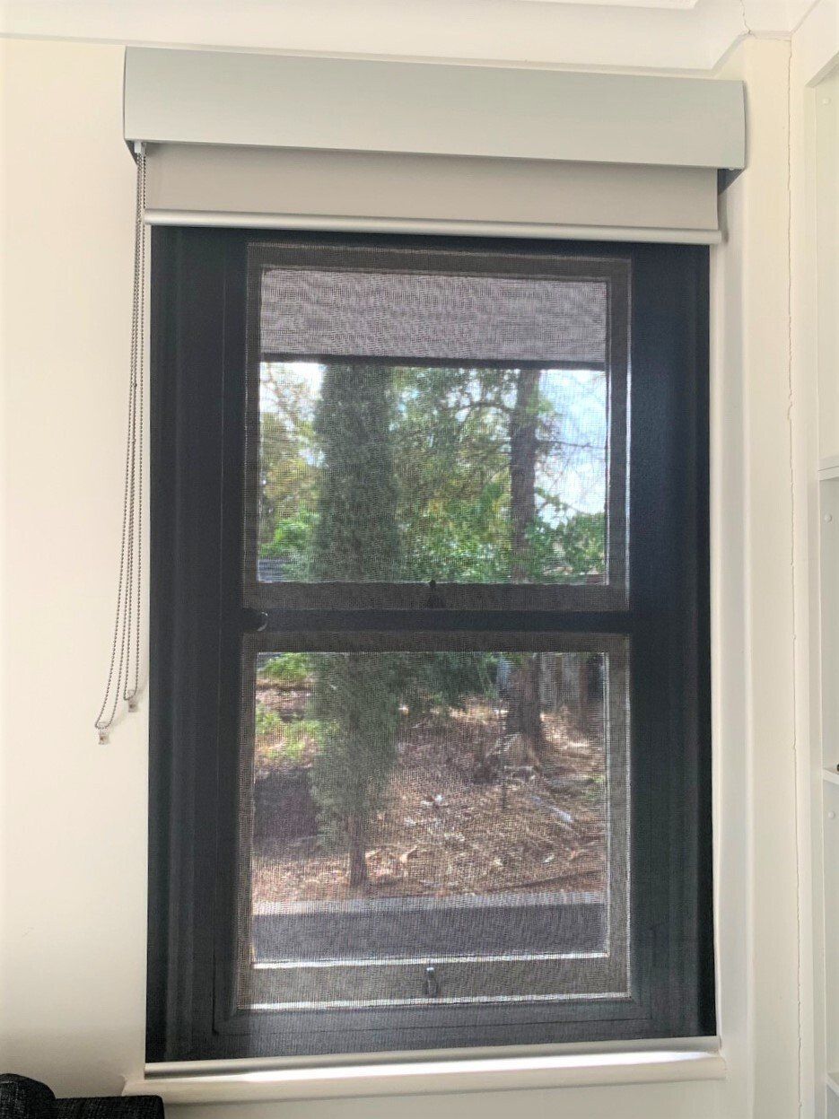 Window with Two Shades the Top One Is Solid and Light-Coloured — Alice Mobile Blinds in Ciccone, NT