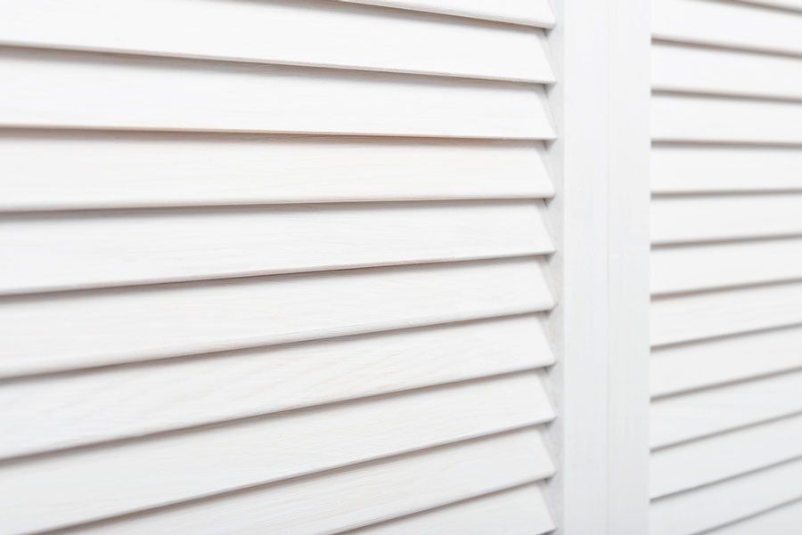 White Wooden Shutters with Horizontal Slats — Alice Mobile Blinds in Ciccone, NT