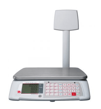 Auf einem weißen Tisch liegt eine weiße Waage.