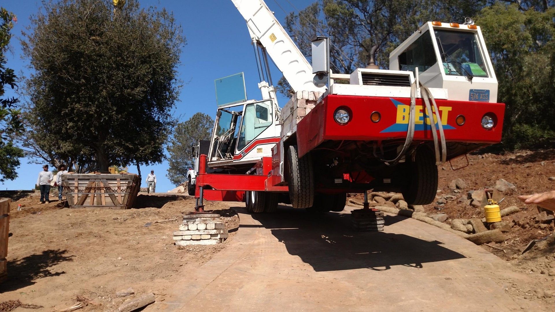 A red and white crane - San Diego, CA - Best Crane Service Inc.