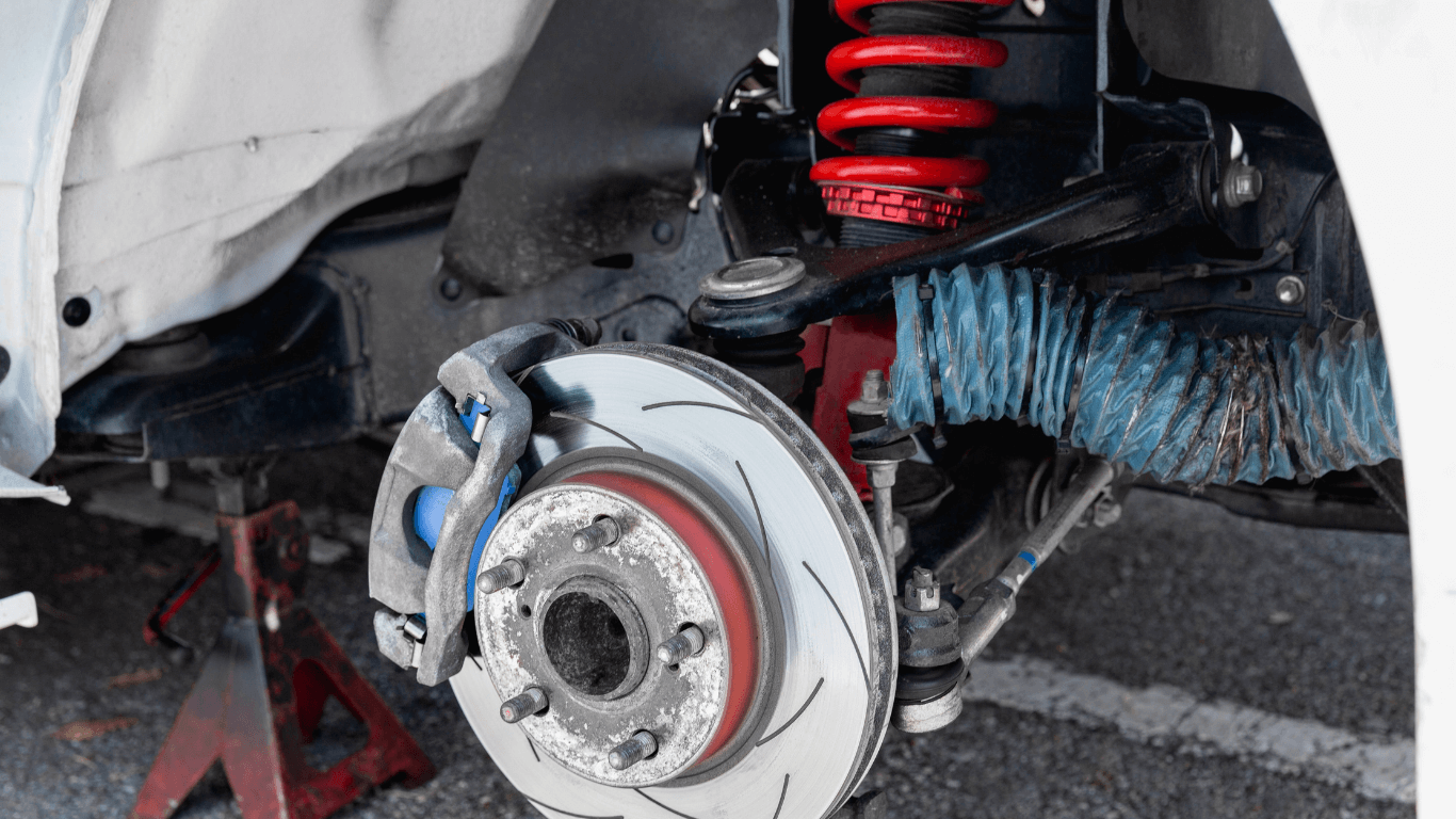 mobile mechanic doing a suspension repair